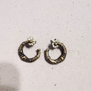 Intricate Gold and Silver Hoop Earrings